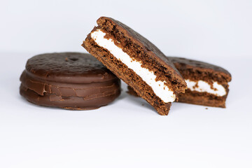 Cookies in chocolate glaze on a white background.