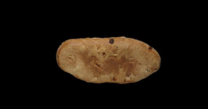 Freshly baked wheat bread with candied fruit, rotation around, alpha channel