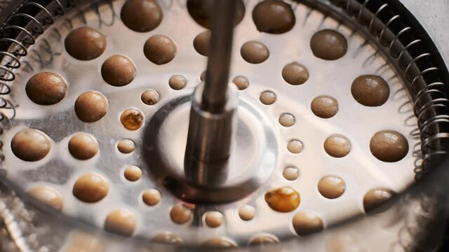 coffee running through a french press as it plunges down