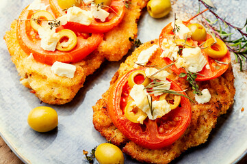 Pork schnitzel with olives