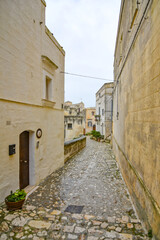 Fototapeta premium A street in Matera, an ancient city built into the rock. It is located in the Basilicata region. 