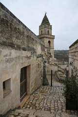 A street in Matera, an ancient city built into the rock. It is located in the Basilicata region.	