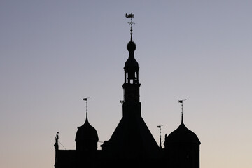 The silhouette of the weighing house in Deventer, the Netherlands, after sunset
