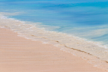 Fototapeta na wymiar Soft wave of ocean on sandy beach