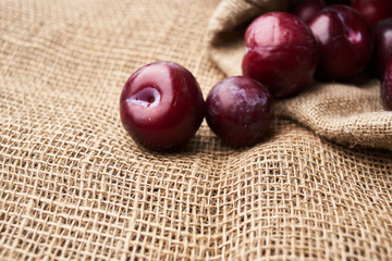 plums fruits natural products on a wooden table top view