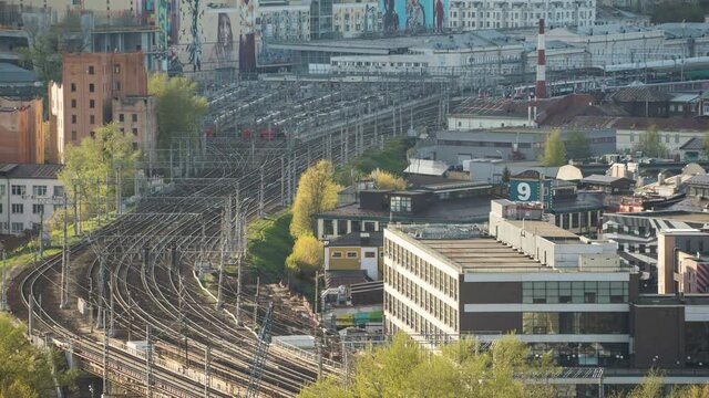 The work of the Kursk railway station in Moscow, Russia Commuter trains and trains like worms come and go at the station, timelapse