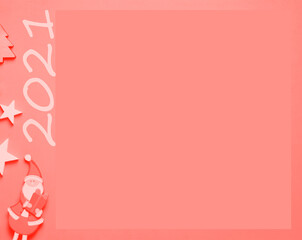 Creation of a red Christmas postcard, small decoration and copy space.