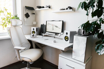 General view home workplace of gamer with computer and gamepad. 