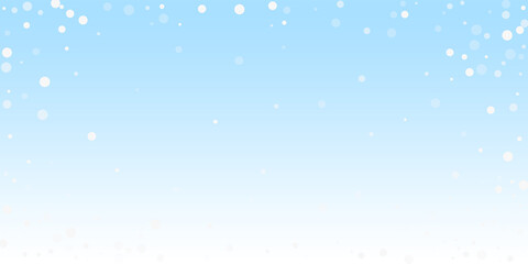 Fototapeta premium White dots Christmas background. Subtle flying sno