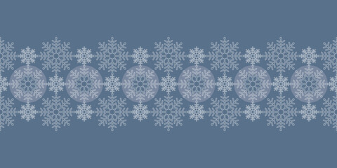 Monochrome Christmas seamless vector pattern Border with white lace snowflakes and circles on blue background. Great for greeting cards, Christmas and New Year cards, invitations and wrapping paper.