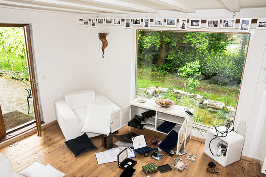 Germany, North Rhine Westphalia, Interior of living room after burglary