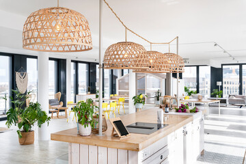 Pendant light hanging over counter at office cafeteria
