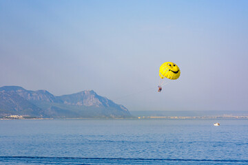 Parasailing at the Mediterranean sea in Turkey. Active and extreme recreation
