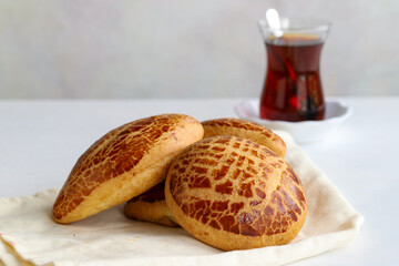 Turkish pastry product , tasty pogaca. Turkish Pastries on a white background. horizontal view. close up. Turkish breakfast.