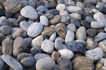 grey pebble stones closeup nature background