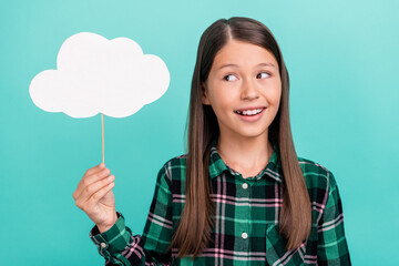 Photo of excited thoughtful school girl dressed checkered clothes looking mind bubble empty space isolated teal color background