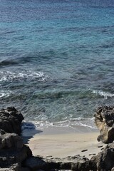 Rocks, the sea and the sand, on the coast of Ibiza, Les Salines Natural Park