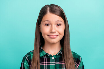 Fototapeta premium Photo of pretty cute school girl dressed checkered clothes smiling isolated teal color background