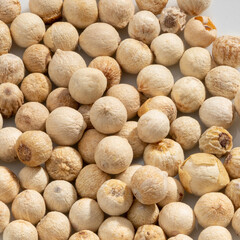 Detailed and large close up shot of pepper & peppercorn.