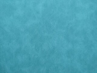 blue suede with a clear texture as the background. High quality photo