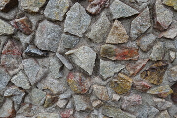 Close shot of surface of colorful gravel pebble dash