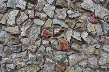 Close view of surface of colorful gravel pebble dash