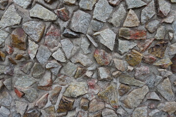 Uneven surface of colorful gravel pebble dash