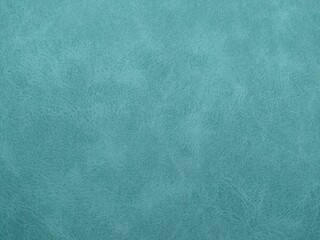 blue suede with a clear texture as the background. High quality photo