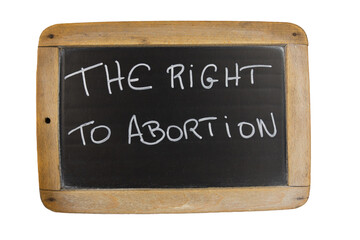 slate with abortion rights written on it in English, isolated on a white background