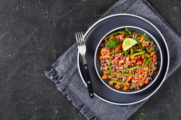 fried brown rice with green beans and carrot