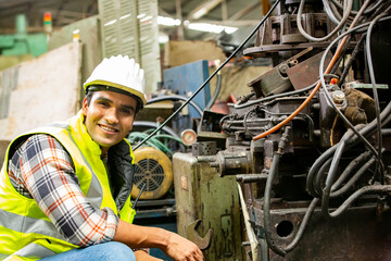 Industrial Engineers in Hard Hats.Work at the Heavy Industry Manufacturing Factory.industrial worker indoors in factory.aged man working in an industrial