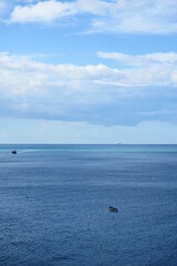 Obraz premium The sea in front of the town of Riomaggiore, Cinque Terre, Italy
