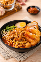 Hokkien mee or Prawn noodle are tossed in pork lard and served with fish balls, shrimp.

Hokkien mee is a Southeast Asian dish that has its origins in the cuisine of China's Fujian (Hokkien) province
