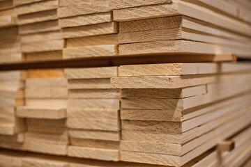 Lumber from boards in warehouse or in store for construction.