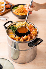 Hokkien mee or Prawn noodle are tossed in pork lard and served with fish balls, shrimp.

Hokkien mee is a Southeast Asian dish that has its origins in the cuisine of China's Fujian (Hokkien) province