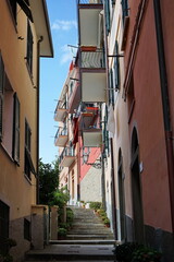Fototapeta na wymiar Alley in the village of Riomaggiore, Cinque Terre, Italy