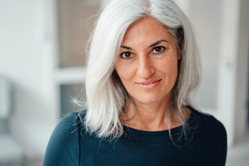 Mature female professional at office