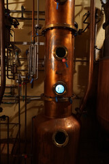 Copper alambic inside distillery - obrazy, fototapety, plakaty