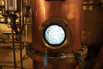 Copper alambic inside distillery