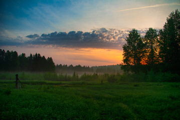 Summer sunset on the outskirts of the village
