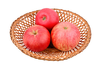 Red apple in wattled basket