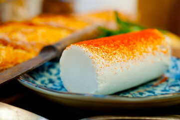 French cheese and fresh  baguette on a wood cutter