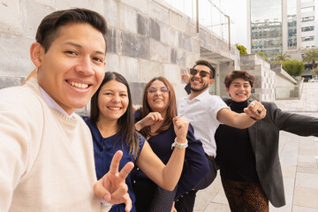 Coworkers leaving the office chatting together.