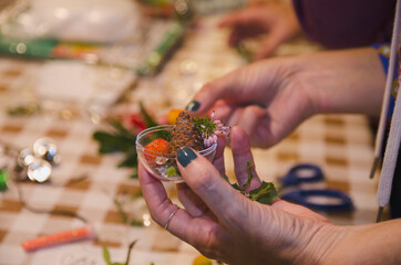 Close up hand working in christmas sphere