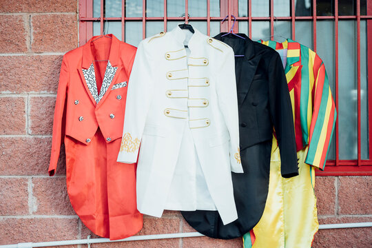 Costumes hanging on window