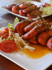 Barbecue seafood with vegetable breakfast on white plate