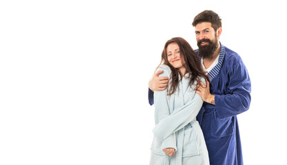 Love and be loved. Couple in love. Happy family in robes. Man hug sleepy woman. Romatic relationship