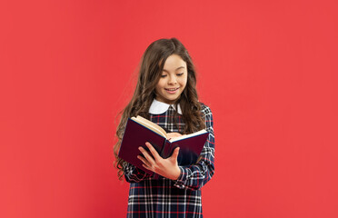 positive pupil or student making notes in notebook. teen girl study with book.