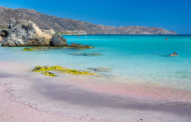 Tropical sandy beach with sandcastles and turquoise water, in Elafonisi, Crete, Greece