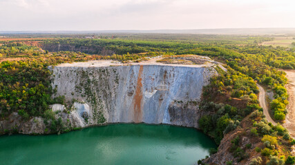 Obraz premium Radon quarry in Ukraine in the rays of the sun. Mining industry. Alexandrovka, Ukraine
